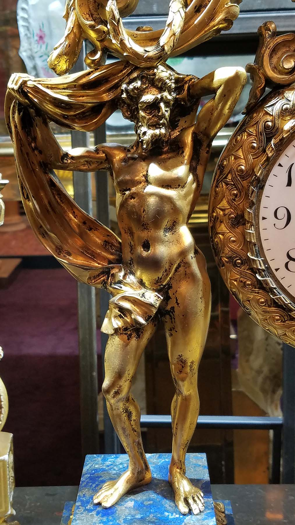 ManArtsAntiquesCenter_ClockMale1