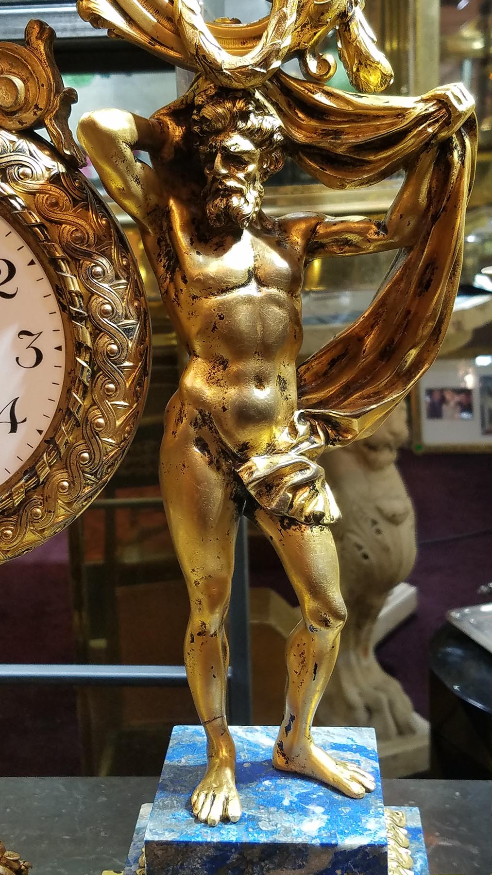 ManArtsAntiquesCenter_ClockMale2