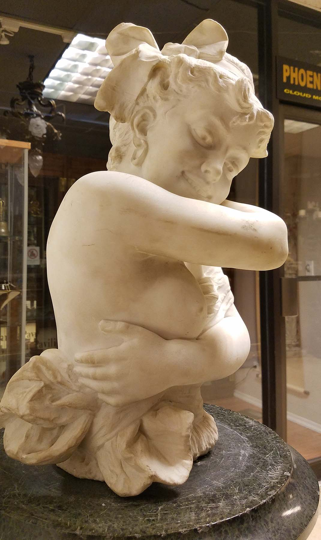 ManArtsAntiquesCenter_GirlExposed1