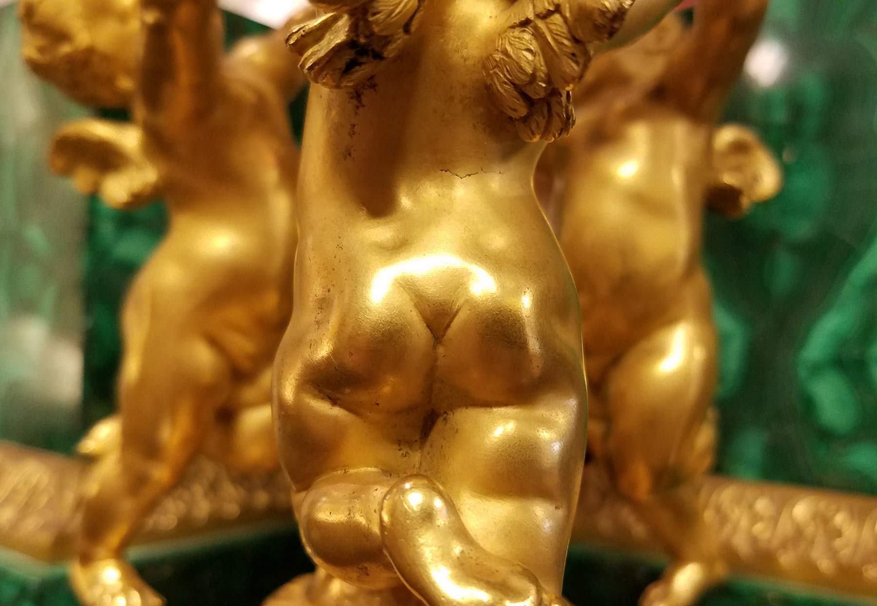 ManArtsAntiquesCenter_Putti-Tucci